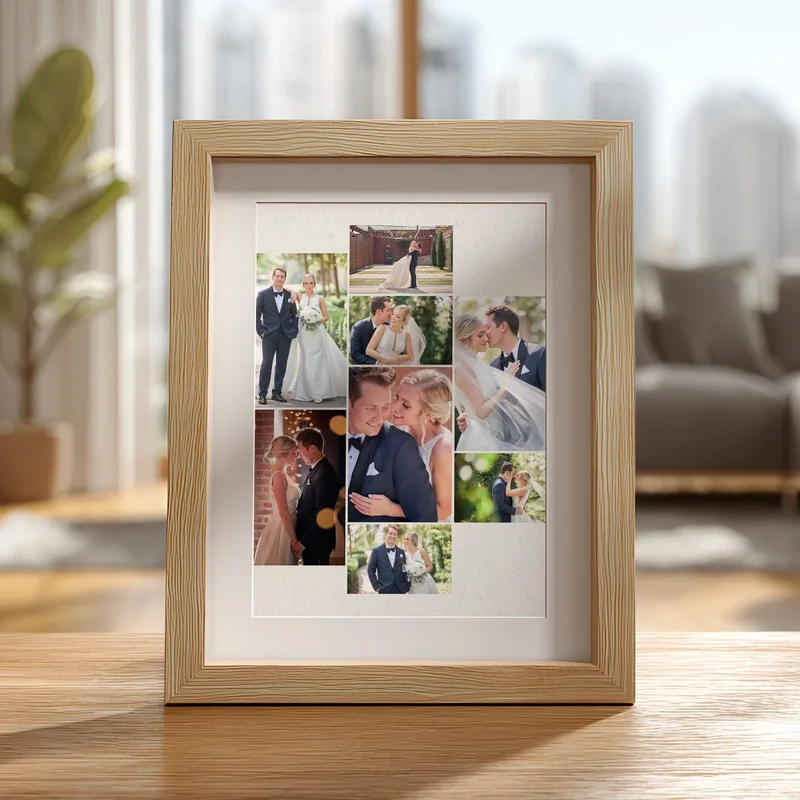 A photo collage of a wedding inside a frame sitting on a desk.